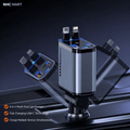 A 4-in-1 multi-port car charger by NHC MART, featuring a metallic gray and black rectangular body with multiple connector ports, shown on a dark reflective surface with floating render views of its plug configurations.