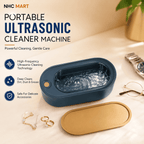 NHC MART portable ultrasonic cleaner machine in a dark teal-blue oval shape with a gold-toned lid, shown on a beige tabletop with decorative accessories and promotional text.