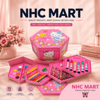 A pink Hello Kitty themed NHC Mart kids' art set displayed open to show its contents, including a paint palette, colored pencils, markers, and crayons, set against a soft pink background with decorative props.