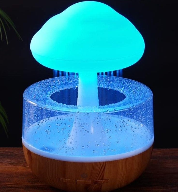 Rechargeable cloud rain aroma diffuser with realistic raindrop effect, cool mist humidifier, and 7-color LED night light for home and office
