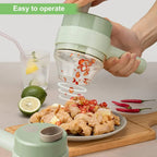 Electric handheld vegetable cutter with stainless steel blades for chopping garlic, onions, vegetables, herbs, and meal preparation