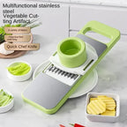 5-in-1 manual food grater with stainless steel interchangeable blades for slicing, shredding, and grating vegetables and fruits.