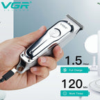 Hair clipper held in a hand with charging cable, VGR brand visible